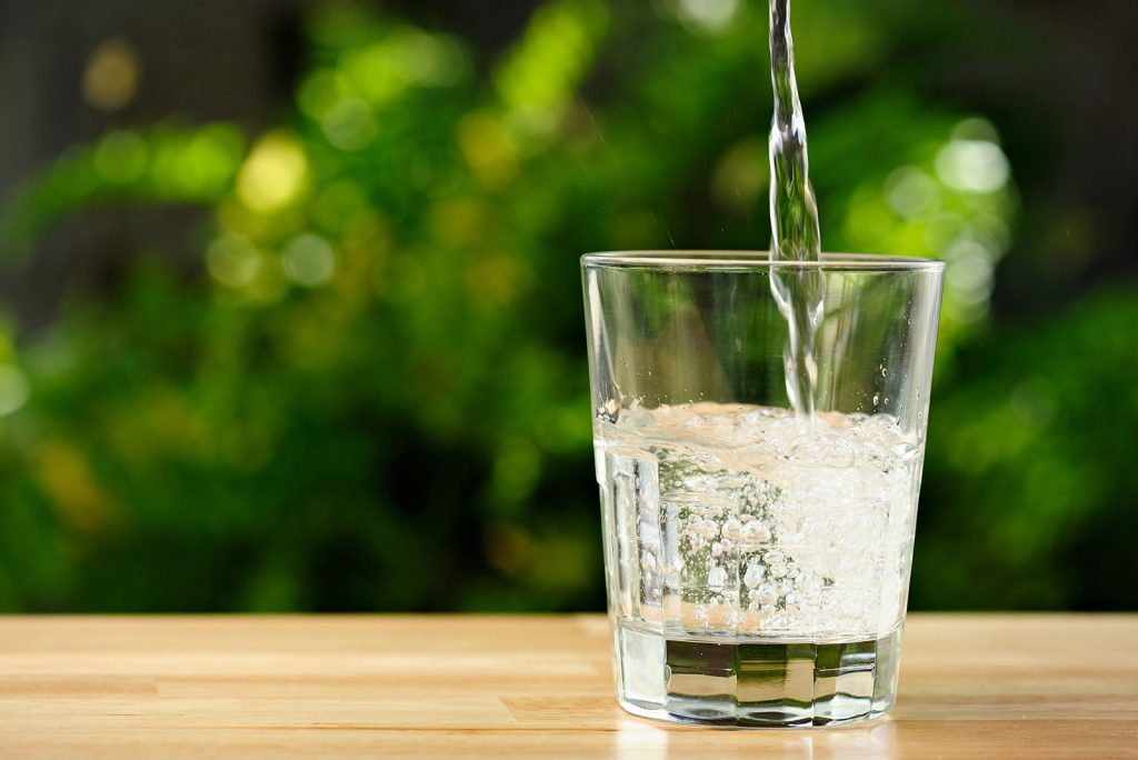 Water pouring into a glass