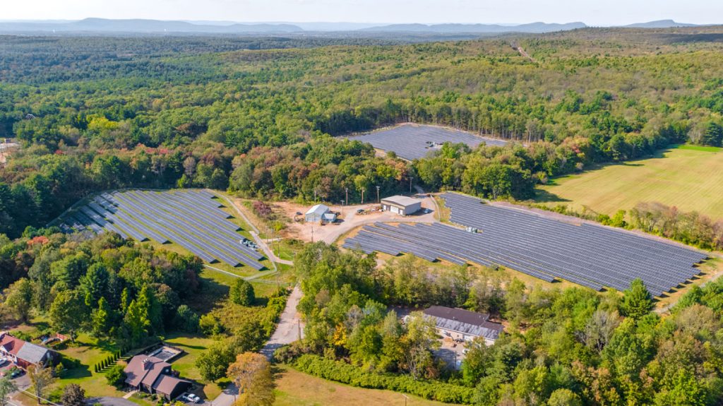 An aerial view of three community solar gardens in Massachusetts