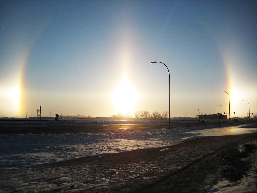 The sundog solar phenomena create the illusion of multiple suns in the sky.