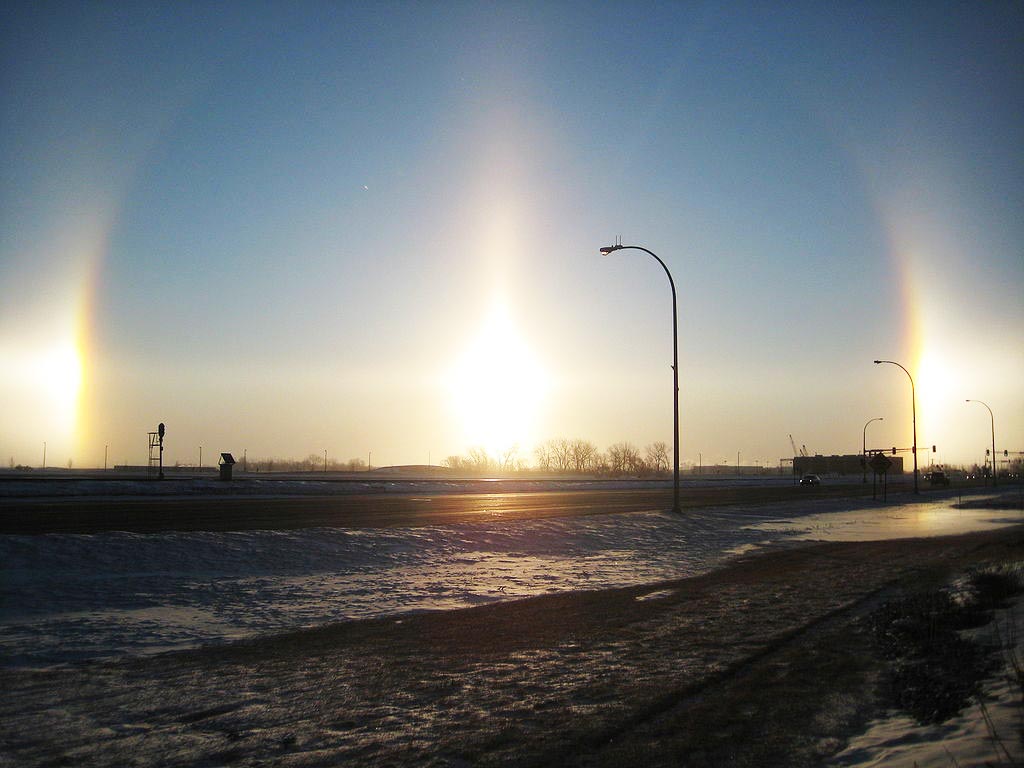 The sundog solar phenomena create the illusion of multiple suns in the sky.