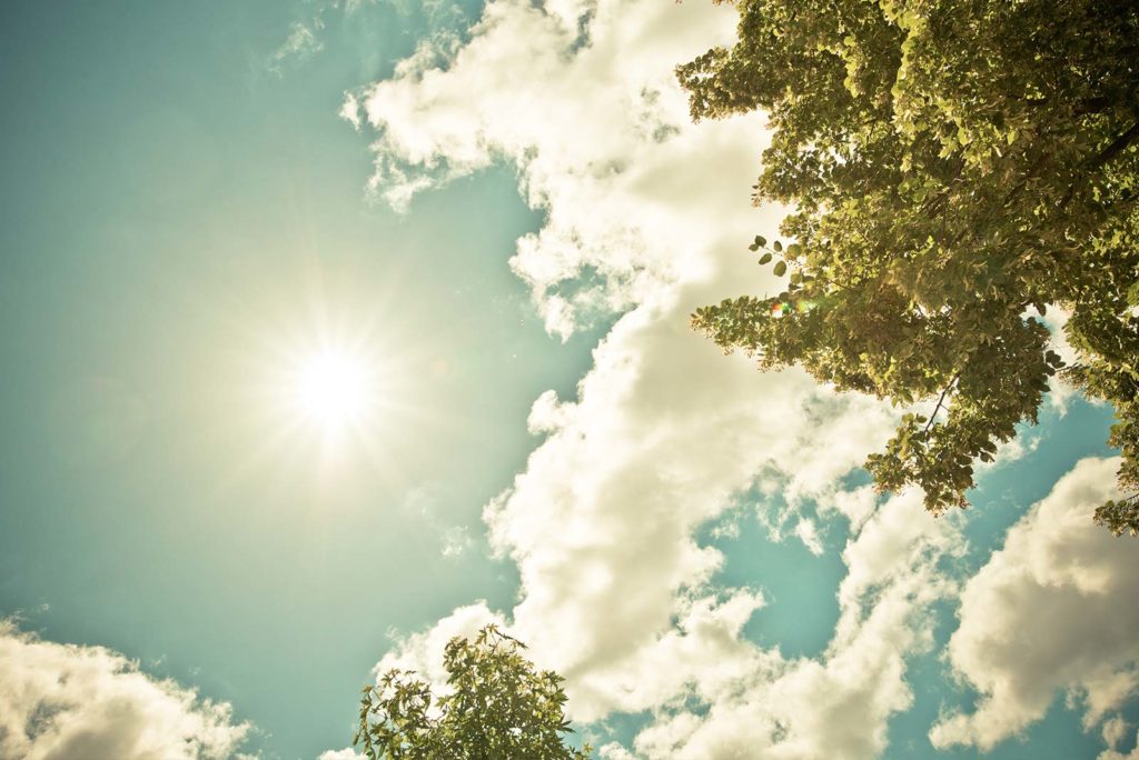 Sun shining through the clouds