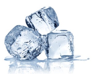 Three ice cubes stacked in a pile
