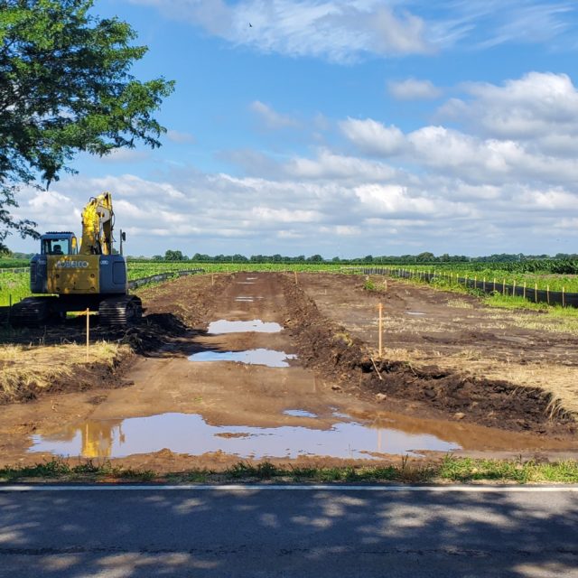 dirt pathway with heavy equipment