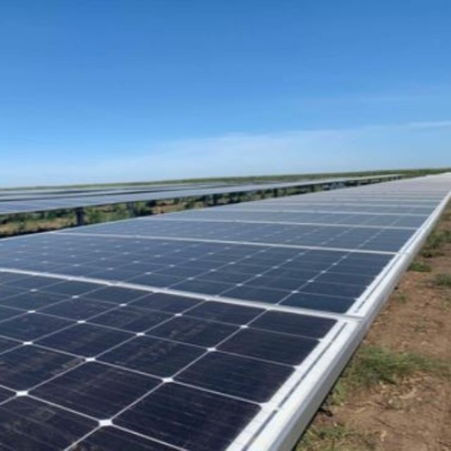 solar panels against blue sky