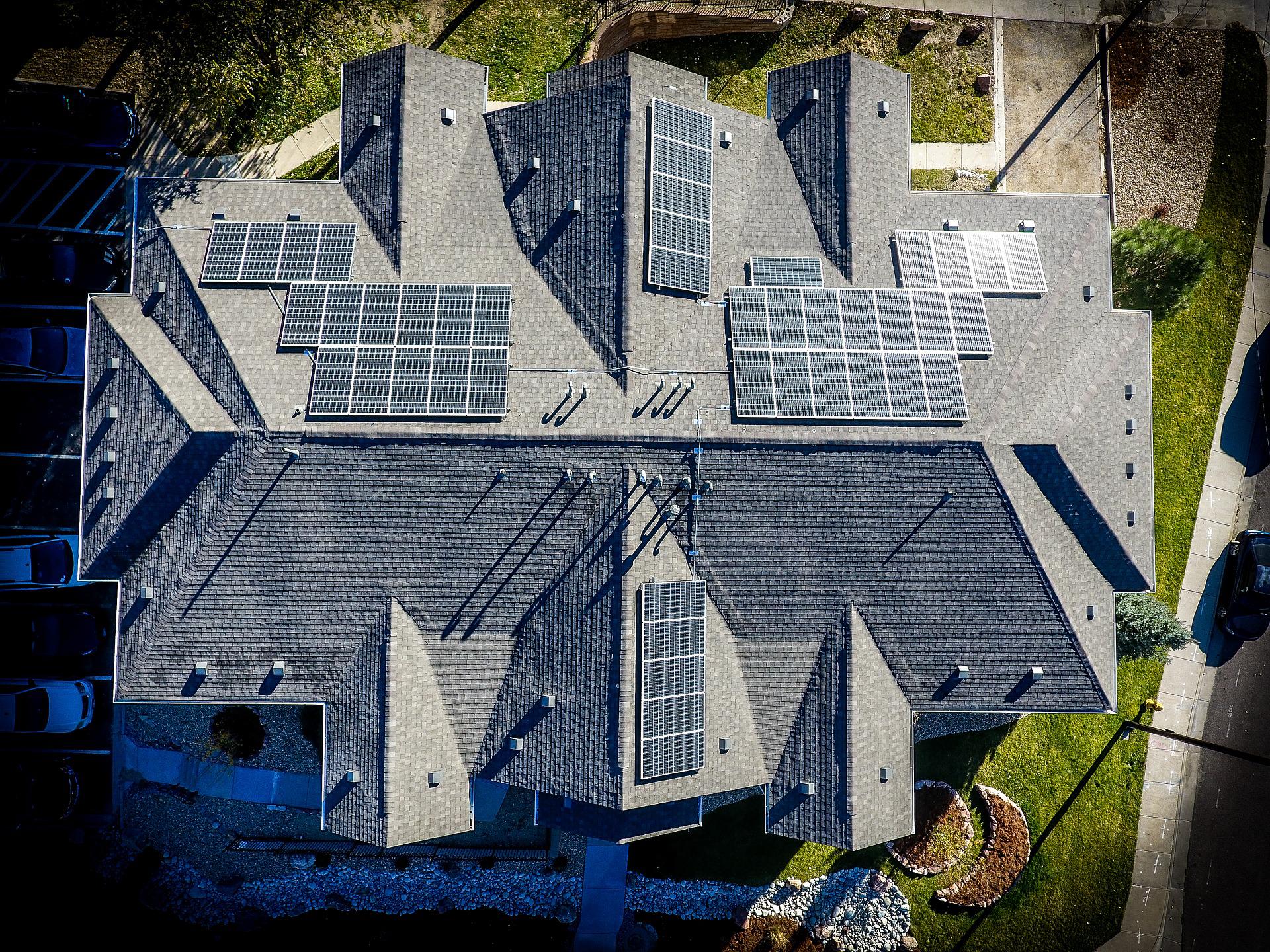 Bird's eye view of someone using community solar panels on their home.
