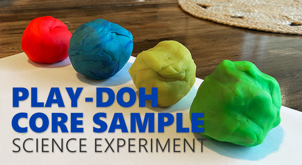 Different colored play-doh balls for a science experiment