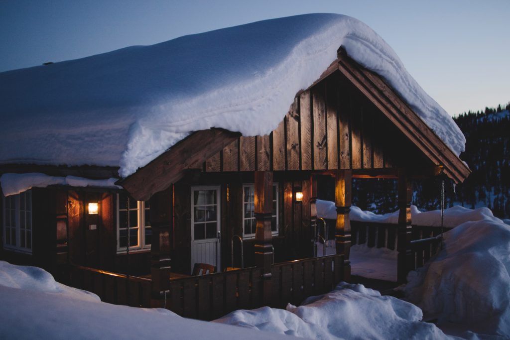 A house with snow, winterized for the winter season.